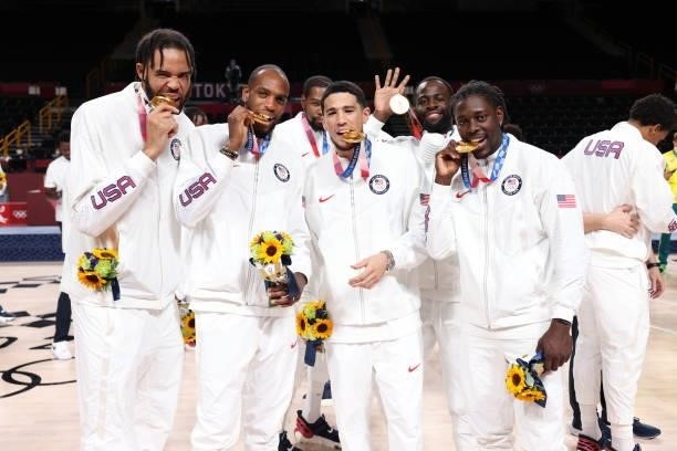 JaVale McGee, Khris Middleton, Devin Booker, Draymond Green, and Jrue Holiday of the USA Men's National Team pose for a picture during the Medal...