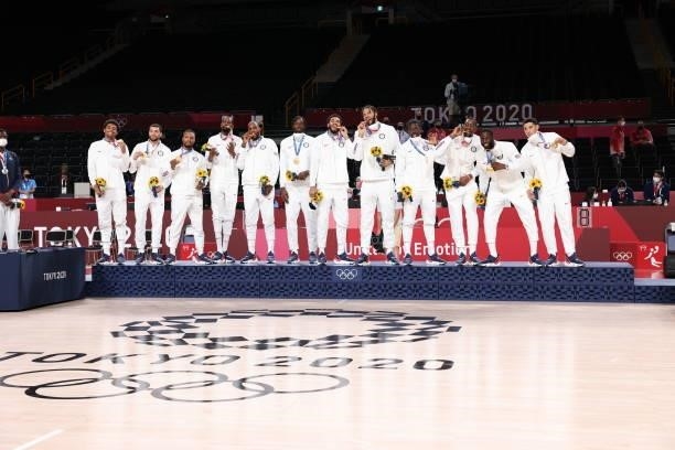 The USA Men's National Team celebrate during the Medal Ceremony of the 2020 Tokyo Olympics at the Saitama Super Arena on August 7, 2021 in Tokyo,...