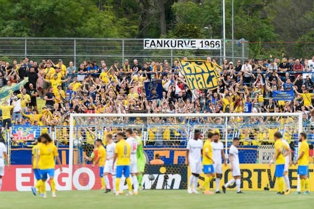 Supporters of 1. FC Lokomotive Leipzig during the DFB Cup first round match between 1. FC Lok Leipzig and Bayer Leverkusen at Bruno-Plache-Stadion on...