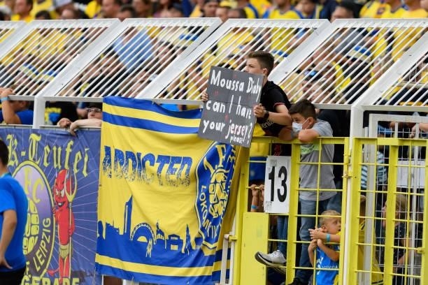 Supporters of 1. FC Lokomotive Leipzig with a Banner during the DFB Cup first round match between 1. FC Lok Leipzig and Bayer Leverkusen at...
