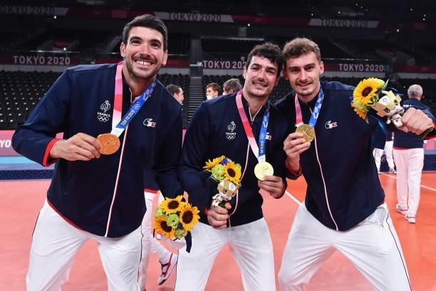 Nicolas LE GOFF of France, Yacine LOUATI of France and Jean PATRY of France celebrates with the gold medal during the Men's Final match between ROC...