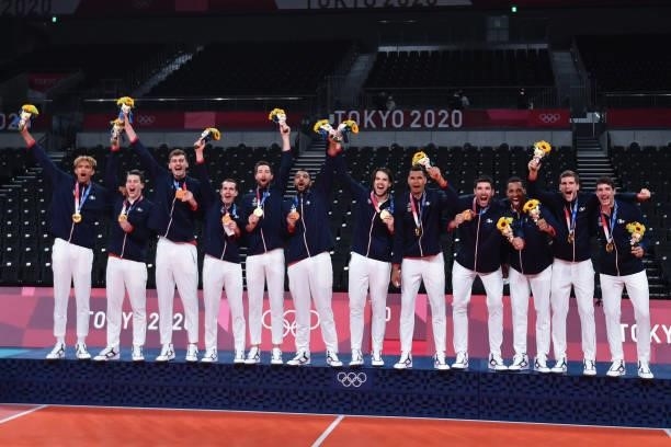 Team of France celebrates the victory on the podium during the Men's Final match between ROC and France at Ariake Arena on August 7, 2021 in Tokyo,...