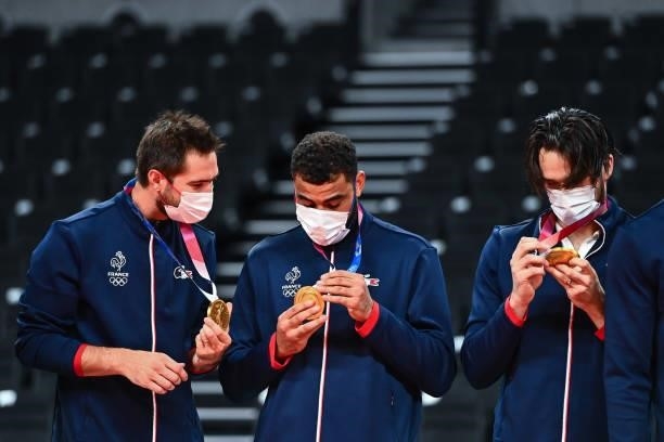 Kevin TILLIE of France, Earvin NGAPETH of France and Antoine BRIZARD of France with their gold medals during the Men's Final match between ROC and...