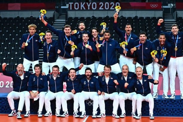 Team of France celebrates the victory with the gold medal on the podium during the Men's Final match between ROC and France at Ariake Arena on August...