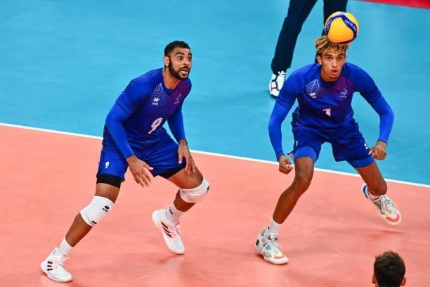 Earvin NGAPETH of France and Barthelemy CHINENYEZE of France during the Men's Final match between ROC and France at Ariake Arena on August 7, 2021 in...