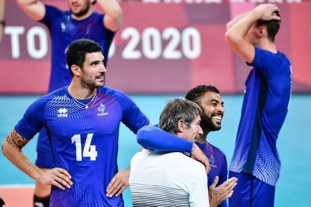 Earvin NGAPETH of France celebrates the victory with Laurent TILLIE coach of France during the Men's Final match between ROC and France at Ariake...