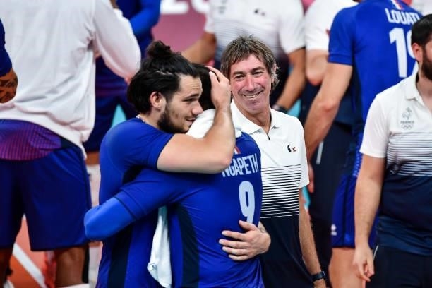 Antoine BRIZARD of France and Laurent TILLIE coach of France celebrate with Earvin NGAPETH of France during the Men's Final match between ROC and...