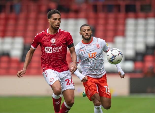 Blackpool's Grant Ward vies for possession with Bristol City's Zak Vyner during the Sky Bet Championship match between Bristol City and Blackpool at...