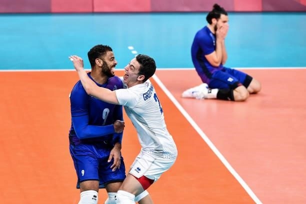 Earvin NGAPETH of France celebrates with Jenia GREBENNIKOV of France during the Men's Final match between ROC and France at Ariake Arena on August 7,...