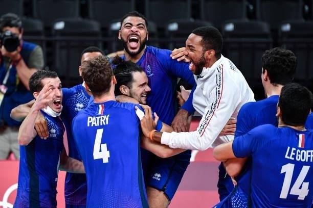Antoine BRIZARD of France celebrates the victory with Earvin NGAPETH of France and his team mates during the Men's Final match between ROC and France...