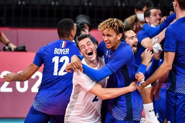 Jenia GREBENNIKOV of France celebrates the victory with Barthelemy CHINENYEZE of France during the Men's Final match between ROC and France at Ariake...