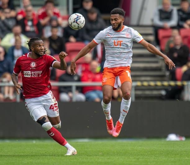 Blackpool's Grant Ward vies for possession with Bristol City's Kasey Palmer during the Sky Bet Championship match between Bristol City and Blackpool...