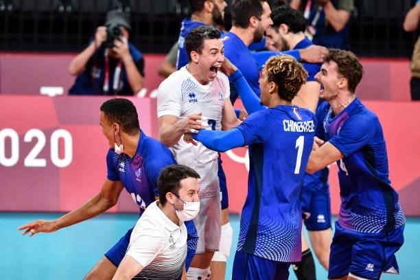 Jenia GREBENNIKOV of France celebrates the victory with Barthelemy CHINENYEZE of France and his team team during the Men's Final match between ROC...