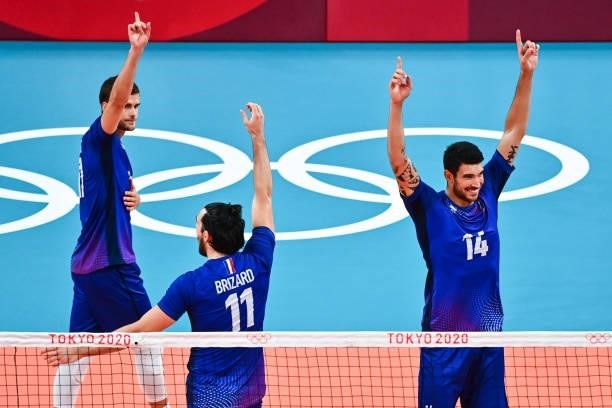 Nicolas LE GOFF of France, Antoine BRIZARD of France and Trevor CLEVENOT of France celebrate during the Men's Final match between ROC and France at...