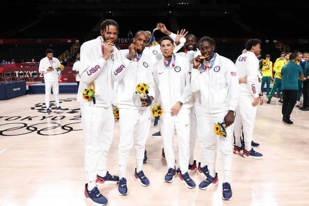 JaVale McGee, Khris Middleton, Kevin Durant, Devin Booker, Draymond Green and Jrue Holiday of the USA Men's National Team pose for a picture during...