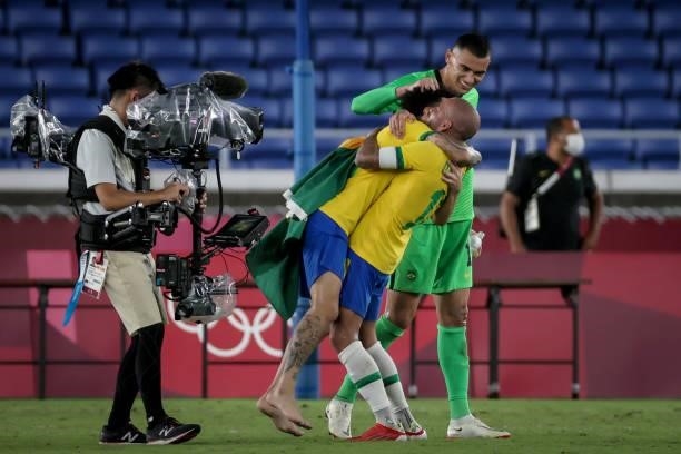 Team Brazil celebrates their side's victory after the Men's Gold Medal Match between Team Brazil and Team Spain on day fifteen of the Tokyo 2020...