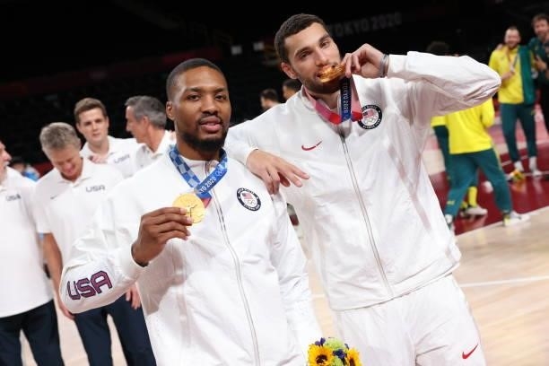 Damian Lillard and Zach LaVine of the USA Men's National Team pose for a picture during the Medal Ceremony of the 2020 Tokyo Olympics at the Saitama...