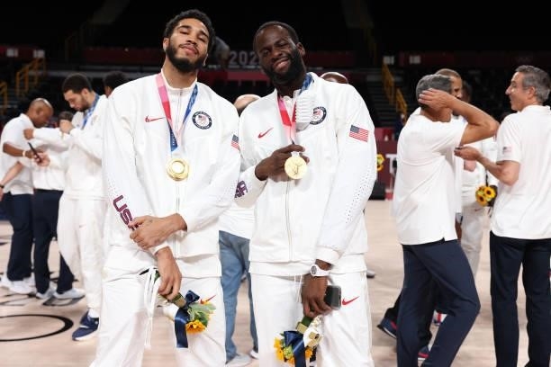Jayson Tatum and Draymond Green of the USA Men's National Team pose for a picture during the Medal Ceremony of the 2020 Tokyo Olympics at the Saitama...