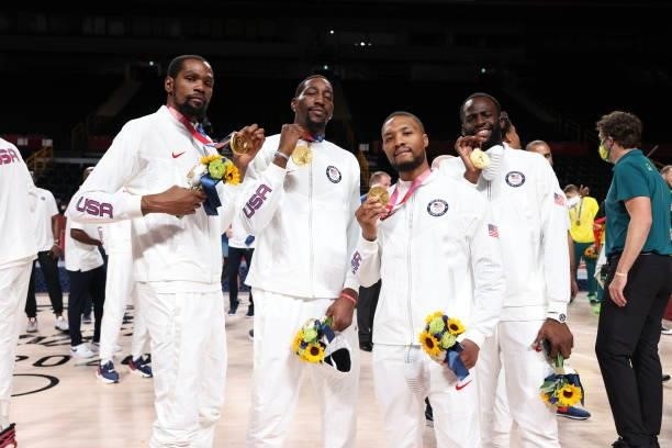 Kevin Durant, Bam Adebayo, Damian Lillard and Draymond Green of the USA Men's National Team pose for a picture during the Medal Ceremony of the 2020...