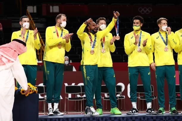 Patty Mills and the Australia Men's National Team celebrate during the Medal Ceremony of the 2020 Tokyo Olympics at the Saitama Super Arena on August...