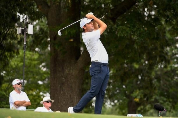 Scottie Scheffler hits his tee shot at the eighth hole during the third round of the World Golf Championships-FedEx St. Jude Invitational at TPC...