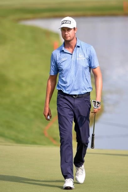 Harris English with putter at the 18th hole during the third round of the World Golf Championships-FedEx St. Jude Invitational at TPC Southwind on...