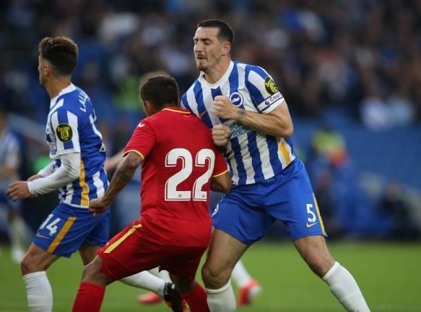 Lewis Dunk of Brighton reacts to a piece of foul play by Suarez of Getafe and retaliates during the Pre Season Friendly Match between Brighton & Hove...