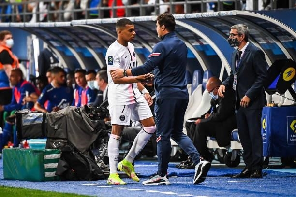 Kylian MBAPPE of PSG and Mauricio POCHETTINO of PSG during the Ligue 1 football match between Troyes and Paris at Stade de l'Aube on August 7, 2021...