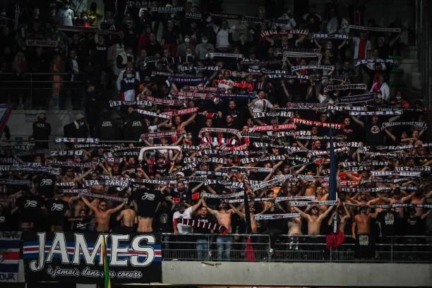 Supporters of PSG during the Ligue 1 football match between Troyes and Paris at Stade de l'Aube on August 7, 2021 in Troyes, France.