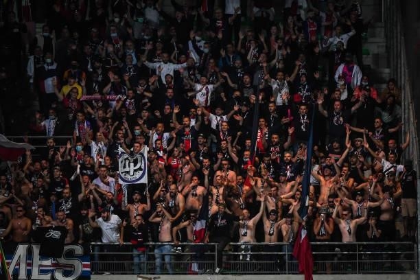Supporters of PSG during the Ligue 1 football match between Troyes and Paris at Stade de l'Aube on August 7, 2021 in Troyes, France.