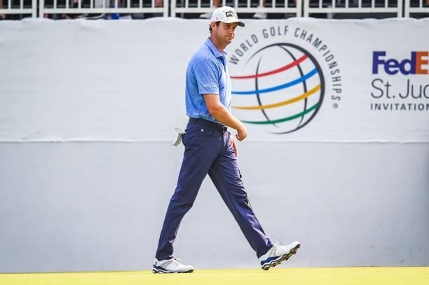 Harris English walks off the 17th hole green after making a birdie putt during the third round of the World Golf Championships-FedEx St. Jude...