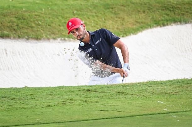 Abraham Ancer of Mexico plays a shot from a greenside bunker on the 16th hole during the third round of the World Golf Championships-FedEx St. Jude...
