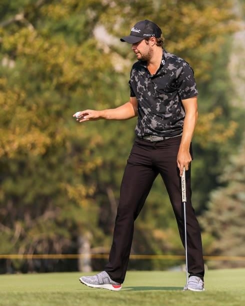 Peter Uihlein acknowledges the crowd after sinking his putt on the 17th green during the third round of the Utah Championship presented by Zions Bank...