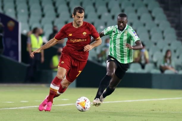 Henrikh Mkhitaryan of AS Roma and Youssouf Sabaly of Real Betis during the pre-season friendly match between Real Betis and AS Roma at Benito...