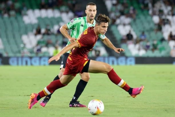 Sergio Canales of Real Betis and Riccardo Calafiori of AS Roma during the pre-season friendly match between Real Betis and AS Roma at Benito...