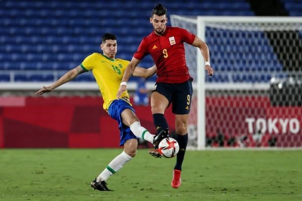 Of Team Brazil competes for the ball with Rafa MIR of Team Spain during The match between Brazil and Spain on day Fifteenth of the Tokyo 2020 Olympic...