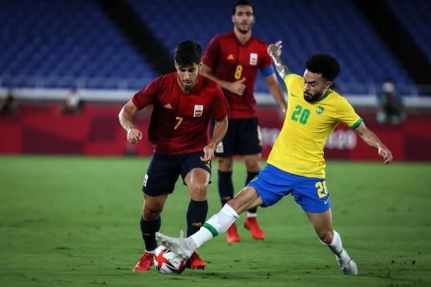 Of Team Brazil competes for the ball with Marco ASENSIO of Team Spain during The match between Brazil and Spain on day Fifteenth of the Tokyo 2020...