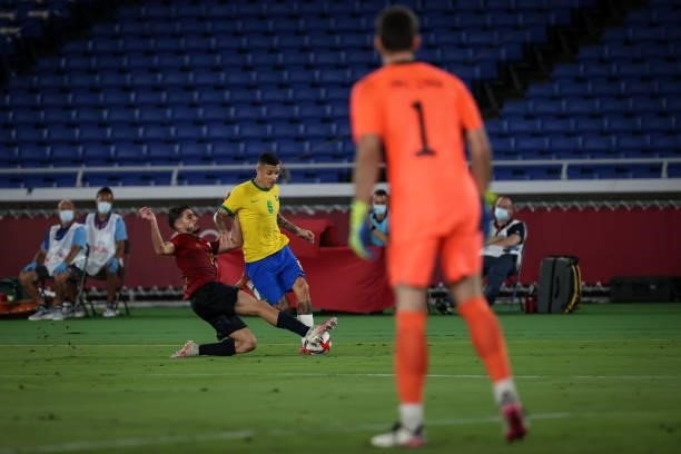 Guilherme ARANA of Team Brazil competes for the ball with Dani OLMO of Team Spain during The match between Brazil and Spain on day Fifteenth of the...