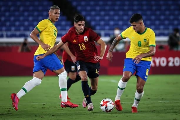Bruno GUIMARAES of Team Brazil competes for the ball with Oscar GIL of Team Spain during The match between Brazil and Spain on day Fifteenth of the...