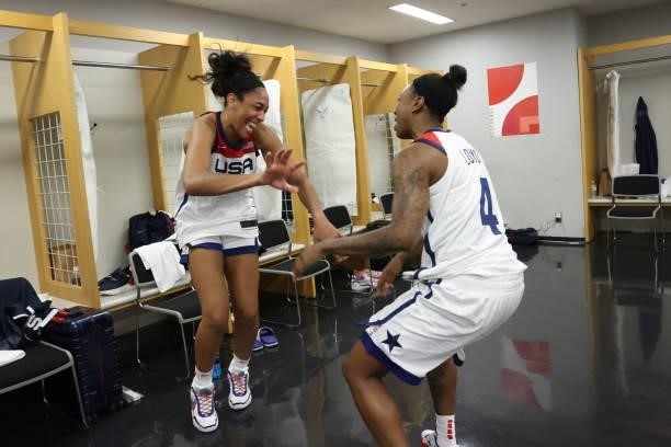 Ja Wilson of the USA Women's National Team high fives Jewell Loyd of the USA Women's National Team after winning the Gold Medal Game of the 2020...