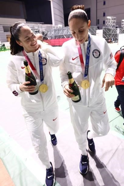 Diana Taurasi of the USA Women's National Team and Sue Bird of the USA Women's National Team smile after the Medal Ceremony of the 2020 Tokyo...