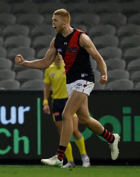 Peter Wright of the Bombers celebrates a goal during the 2021 AFL Round 21 match between the Western Bulldogs and the Essendon Bombers at Marvel...