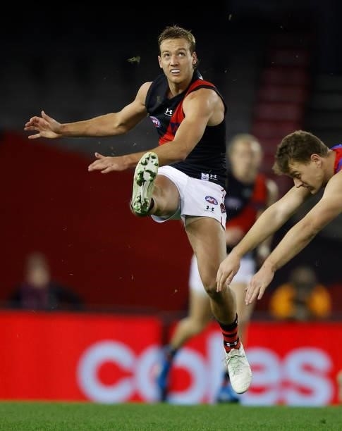 Darcy Parish of the Bombers kicks the ball during the 2021 AFL Round 21 match between the Western Bulldogs and the Essendon Bombers at Marvel Stadium...