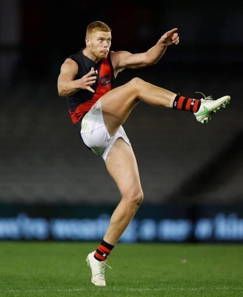 Peter Wright of the Bombers kicks for goal during the 2021 AFL Round 21 match between the Western Bulldogs and the Essendon Bombers at Marvel Stadium...