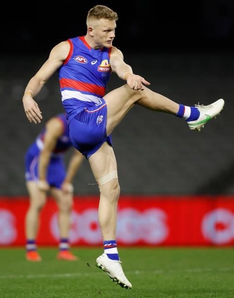 Adam Treloar of the Bulldogs kicks the ball during the 2021 AFL Round 21 match between the Western Bulldogs and the Essendon Bombers at Marvel...