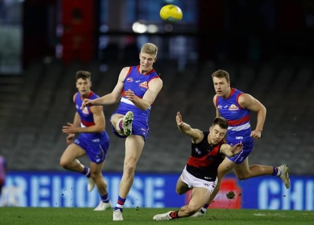 Tim English of the Bulldogs kicks the ball during the 2021 AFL Round 21 match between the Western Bulldogs and the Essendon Bombers at Marvel Stadium...