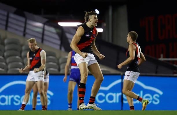 Sam Draper of the Bombers celebrates as the final sign sounds during the 2021 AFL Round 21 match between the Western Bulldogs and the Essendon...