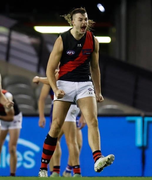 Sam Draper of the Bombers celebrates as the final sign sounds during the 2021 AFL Round 21 match between the Western Bulldogs and the Essendon...