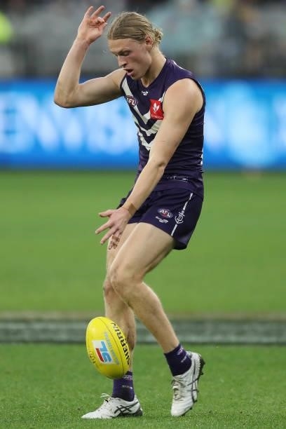 Hayden Young of the Dockers kicks the ball during the 2021 AFL Round 21 match between the Fremantle Dockers and the Brisbane Lions at Optus Stadium...