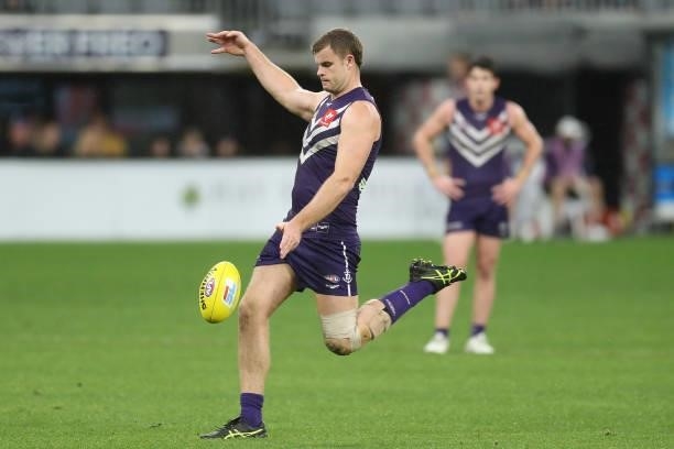 Sean Darcy of the Dockers kicks on goal during the 2021 AFL Round 21 match between the Fremantle Dockers and the Brisbane Lions at Optus Stadium on...